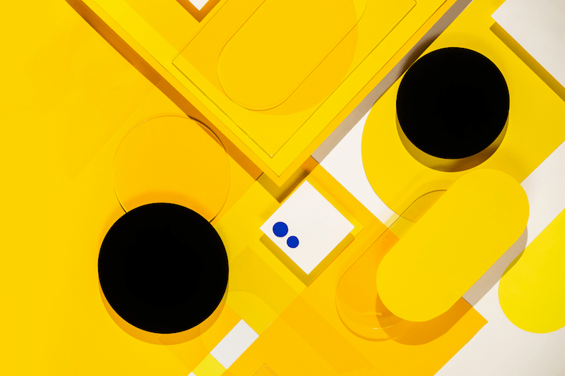 Geometrical shapes on yellow background